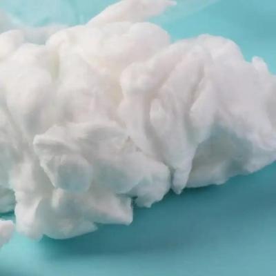 Absorbent bleached cotton